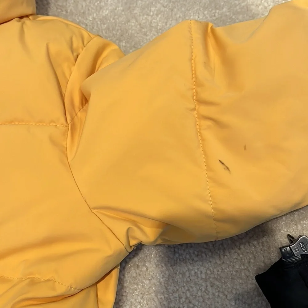Yellow puffer jacket